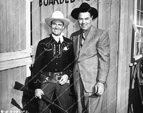 Gene Autry gets visit from Heavyweight Boxing Champ Jack Dempsey on location - 1950 film Beyond the Purple Hills - 0430-001