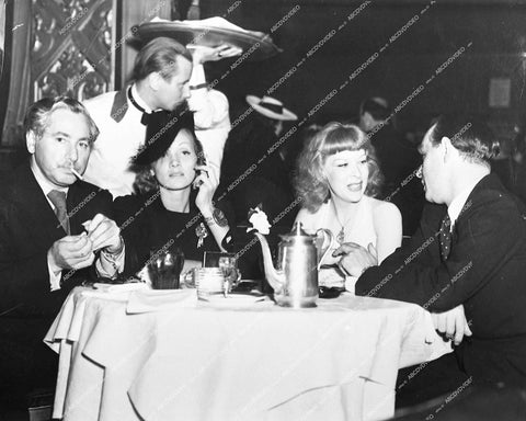 great candid - director Josef von Sternberg, Marlene Dietrich, Gertrude Niesen out to dinner - 0431-032