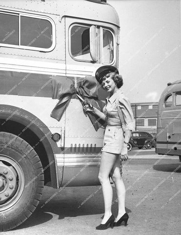 lovely Dorothy Abbott shows off legs and tidies up tour bus - 0436-013