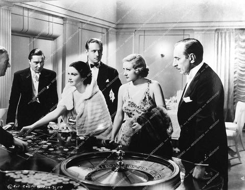 Melvyn Douglas, Douglass Dumbrille, Gail Patrick, Tala Birell, Henry Mollison at the roulette table - 1935 film The Lone Wolf Returns - 0449-034