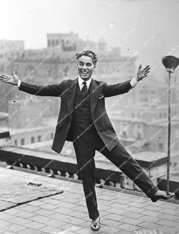 Charles Chaplin dancing on rooftop of some building circa 1923 - 0451-022