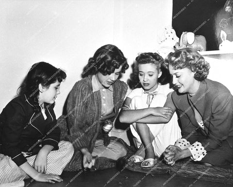 Jeanette MacDonald, Jane Powell, Elinor Donahue, Ann E Todd playing jacks - 1948 film Three Daring Daughters - 0452-034