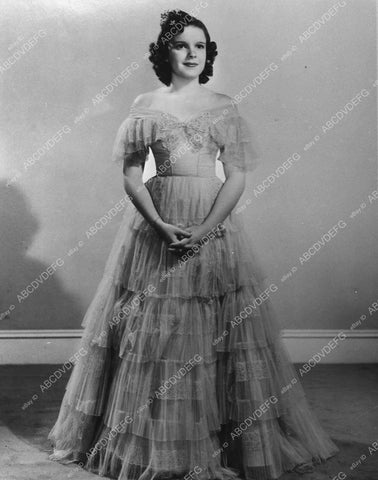 Judy Garland modeling her new dress 455-18 - 0455-018