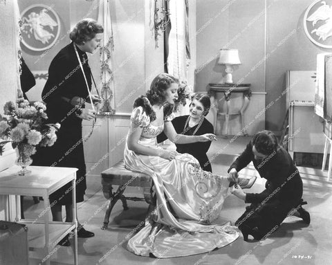 Jeanette MacDonald getting feet fitted for shoes - 1939 film Broadway Serenade - 0456-021