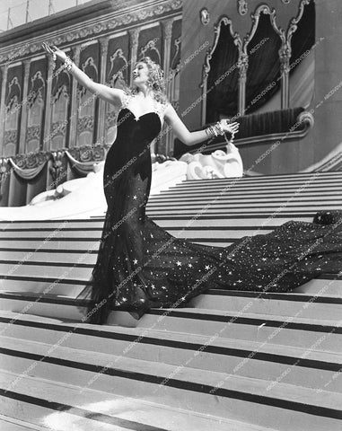 shapely Ilona Massey in elegant black gown - 1937 film Rosalie - 0457-001