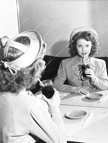 Shirley Temple enjoying a soda - 0457-027