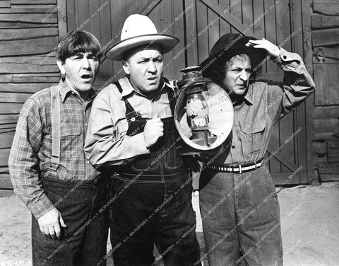 3 Stooges Moe Howard, Curly Howard, Larry Fine - 1944 short subject film The Yoke's on Me - 0458-029
