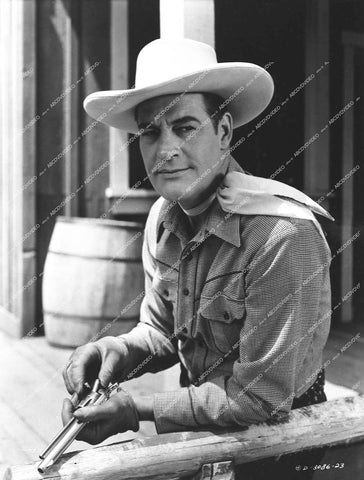 Charles Starrett loading his six shooter - 1951 film The Kid from Amarillo - 0459-025