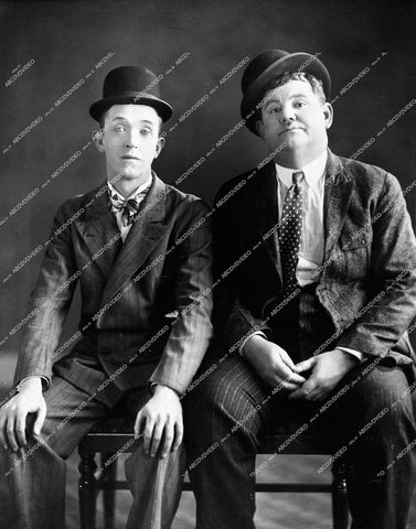 Stan Laurel, Oliver Hardy - 1927 silent short subject film Hats Off - 0461-011