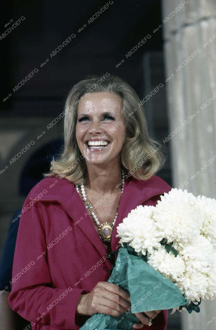 beautiful Honor Blackman with some flowers 35m-873
