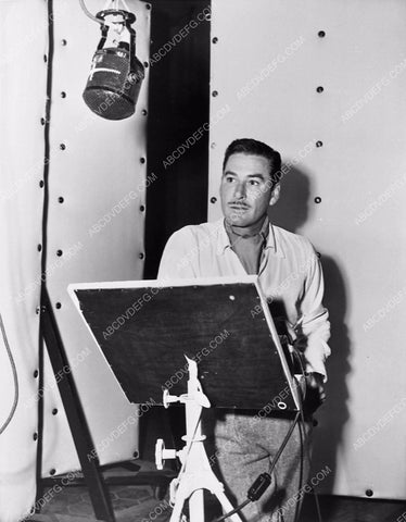 candid Errol Flynn in sound studio film That Forsyte Woman 142-03