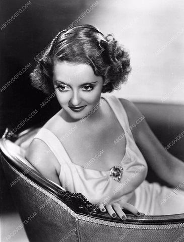 Bette Davis seated in chair portrait 333-03