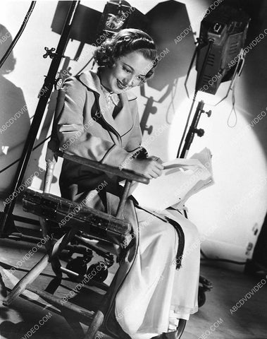 candid Olivia de Havilland reading the script on set film Call It a Day 734-18