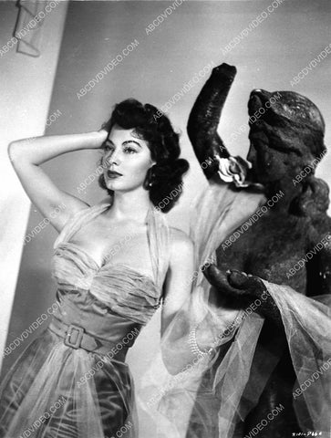 Ava Gardner posing w a statue film Pandora and the Flying Dutchman 809-32