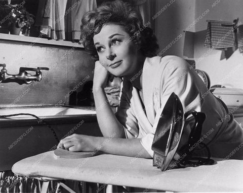 Susan Hayward finished ironing in photo from Back Street 835-25