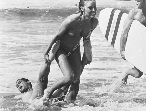 Sharon Tate hauling Tony Curtis out of the surf film Don't Make Waves 847-07