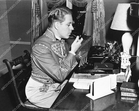 candid Nelson Eddy answering some letters via typewriter 859-02