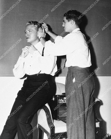 candid Nelson Eddy gets makeup touchup unknown film 859-18