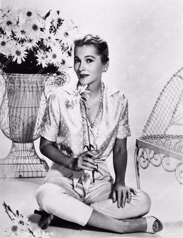 Joan Fontaine sitting portrait with flowers 934-33