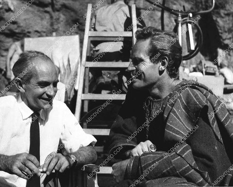 Charlton Heston and someone on set film Ben-Hur 944-30