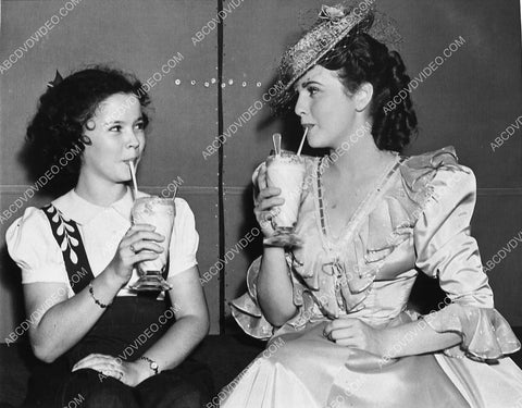 candid Shirley Temple w Deanna Durbin enjoying a milk shake 1032-26