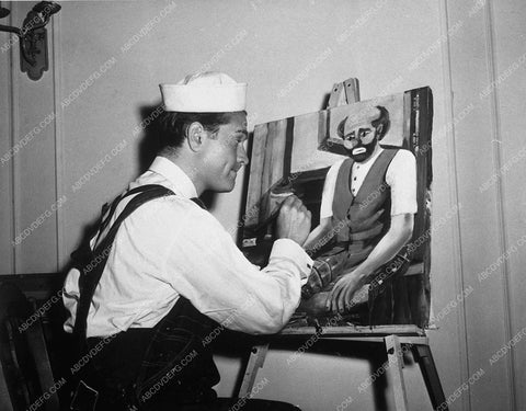 candid Red Skelton painting one of his clown pictures 10346-15