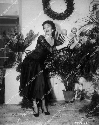 Yvonne De Carlo shaking the maracas 10771-30