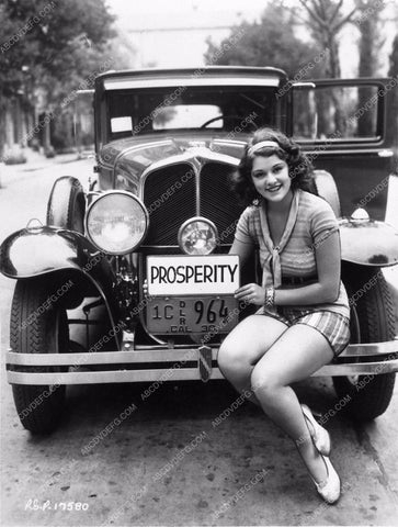 leggy Lillian Roth poses with her new 1930 Oakland automobile pre-code 1098-36