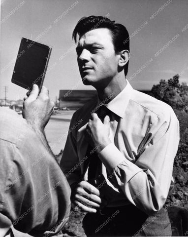 candid Lawrence Harvey doing a mirror check Summer and Smoke 1197-14