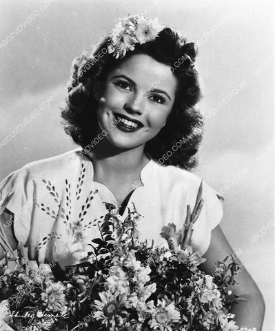 Shirley Temple and some flowers film I'll Be Seeing You 1206-28