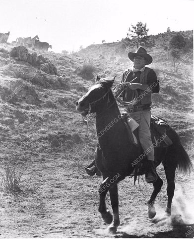 John Wayne on horseback film The Sons of Katie Elder 1209-36