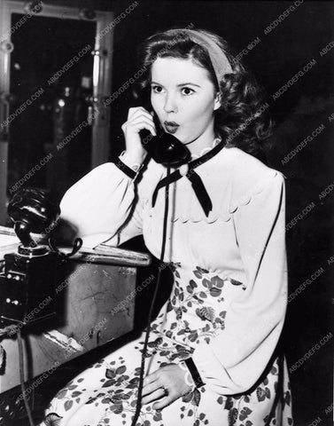 candid Shirley Temple on the telephone behind the scenes 1211-13