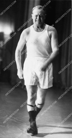 Maurice Chevalier in his garters on stage for Paris Strip Tease 1332-26
