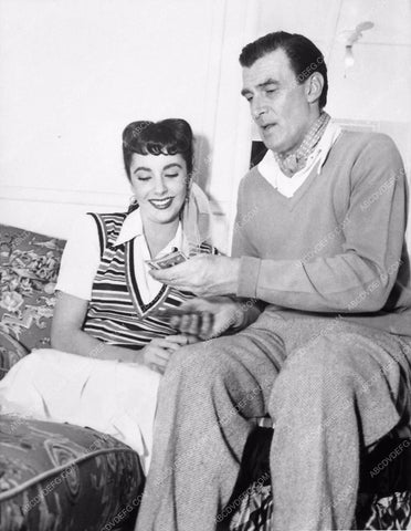 candid Elizabeth Taylor Walter Pidgeon playing cards behind the scenes 1454-18