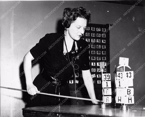 author Gwen Bristow looks like using a strategic naval board or something 1463-06