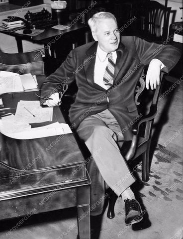 author Thomas Costain sitting at his desk 1463-09