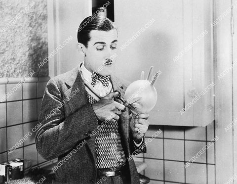 Charley Chase playing w a rubber glove unknown comedy short 1501-36