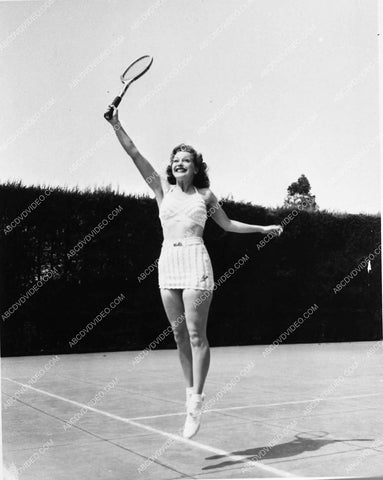 beautiful and athletic Julie Bishop on the tennis court 1565-35