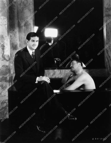 director George Hill w Wallace Beery in the bathtub on set film The Secret Six 1626-14