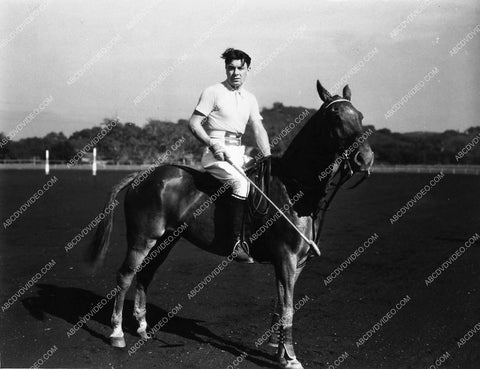 athletic George Brent out for some polo 1626-24