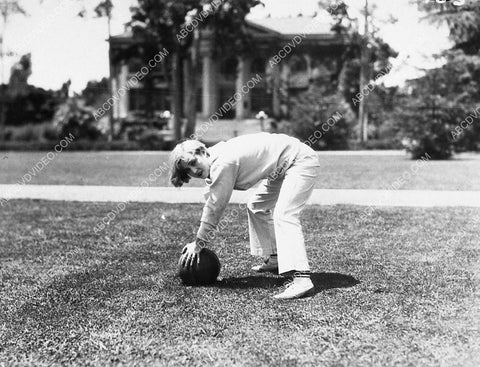 candid Marion Davies does some exercises with the ball outdoors 1660-08