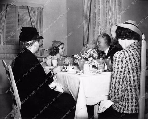 candid Shirley Temple out to dinner 1684-17