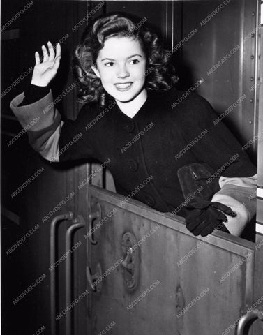 Shirley Temple portrait waving from train 1684-23