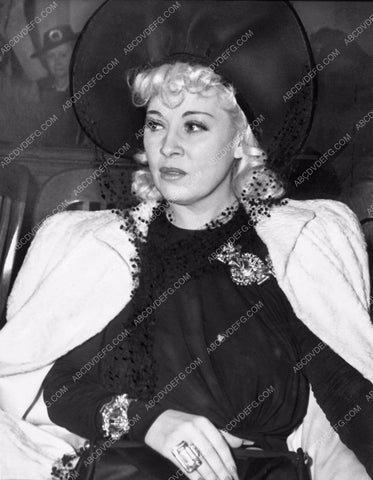 candid Mae West seated 1864-19