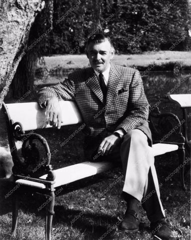 handsome pose on park bench Clark Gable 1910-11