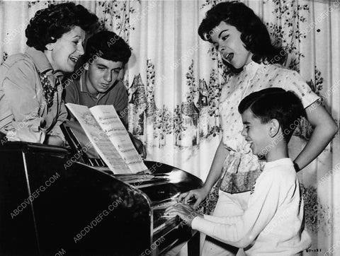 candid Annette Funicello w friends and family at the piano 2011-09