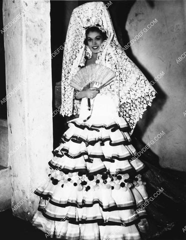 MGM model, models her gowns by Adrian Greenberg film Girl of the Golden West 2114-35