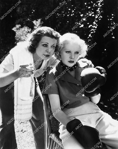 Barbara King coaches Alice Faye in her boxing gloves 2120-08