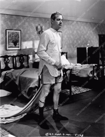 Melvyn Douglas in garters film There's Always a Woman 2192-10
