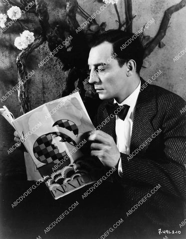 Buster Keaton reading a magazine on set film Free and Easy 2237-35
